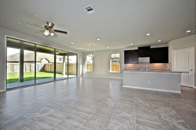 Casual Dining is amazing with all the walls of windows and the Disappearing Sliding Glass Door!  This Home is an Energy Saving Home and will save you money on your Electrical Bills and Gas Bills!  Ask us how low!!