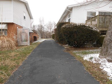 BLACK TOP DRIVEWAY TO GARAGE