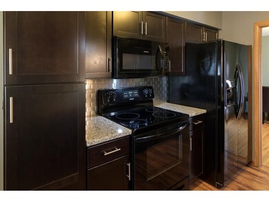New appliances and counters  Espresso cabinetry