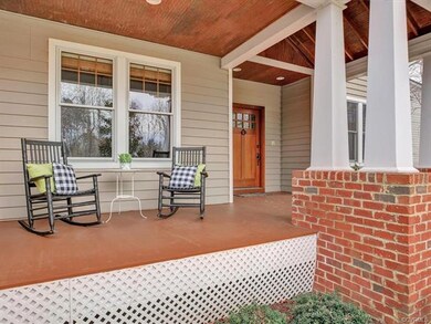 Covered front porch with bead board ceiling