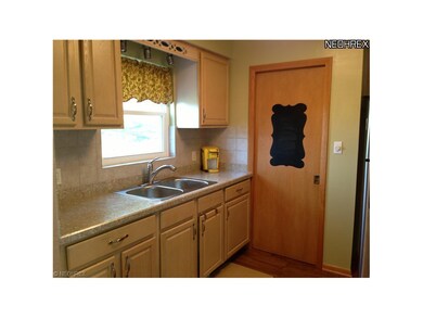 Updated kitchen with newer counter tops m ceramic 