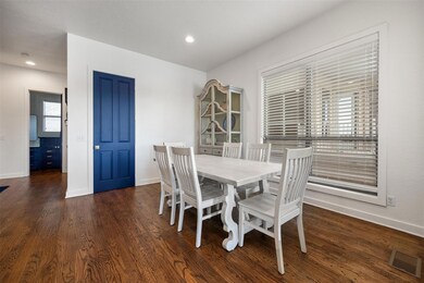 Dining area featuring recessed lighting, visible v
