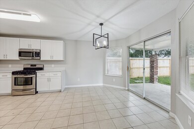 Bright and inviting breakfast nook with outdoor vi