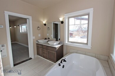 Master Bathroom with Double Sinks, Water Closet, L