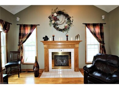 Gas Log Fireplace Located in Family Room