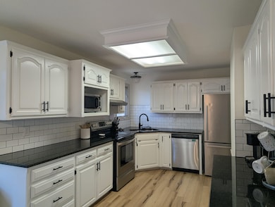 1525 E Pheasant Run St, Derby, KS 67037 - photo 2