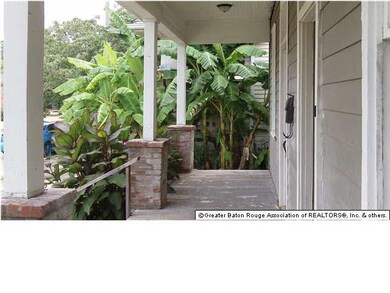 Lots of space on porch as you enter the home