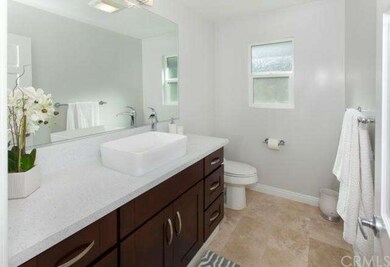 Main level bathroom with new faucet, sink, cabinet