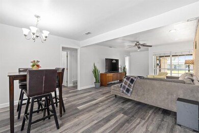 Dining room opens to Living room and Kitchen.