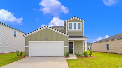 View of front of home featuring a front lawn and a