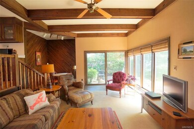 Step-down from the kitchen into this spacious fami