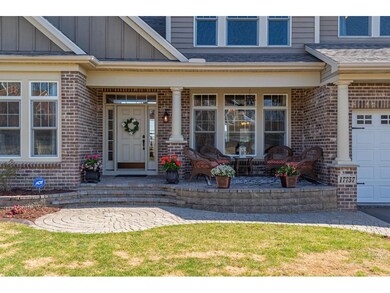 CUSTOM PORCH WITH STONE PAVER PATIO