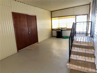 Staircase featuring concrete floors