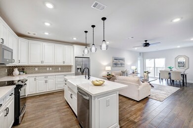 Another view of the spacious kitchen.
