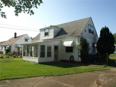 Beautiful sunroom and back yard!
