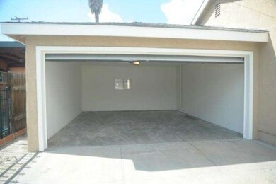 Large garage with possible laundry area 