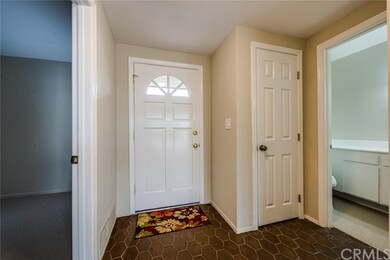 Front Entry, Hall Closet, and Guest Bath, and on l