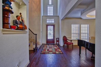 View of the foyer from inside hallway to living ar