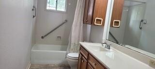 Full bathroom with vanity with extensive cabinet s