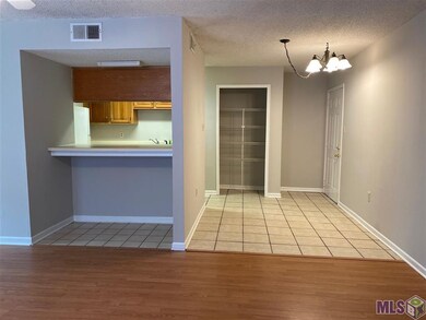 Open bar from kitchen overlooks living room. Lots 