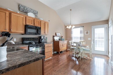Spacious dining area is flooded with natural light