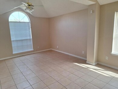 Unfurnished room featuring light tile patterned fl