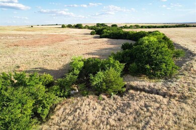 Birds eye view of property featuring a rural view
