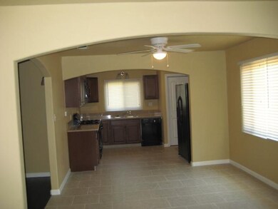 Large breakfast area opens to kitchen. Big window 