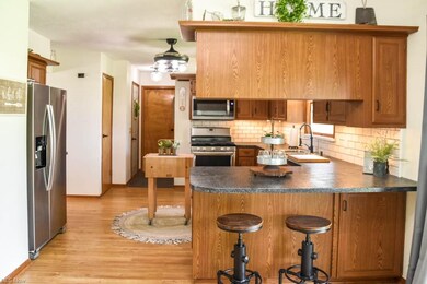 Updated eat-in kitchen with a breakfast bar.
