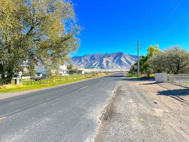 View of asphalt street with a mountain view