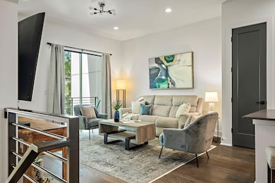 Living room featuring dark wood-type flooring and