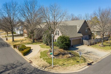 Corner lot with circle front drive and side-entry