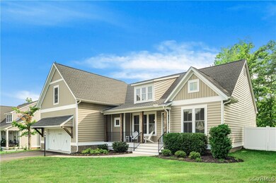 Craftsman style home with fenced rear yard.