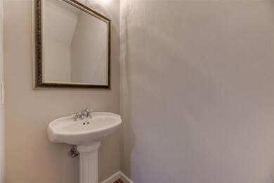Convenient powder room on the main floor has newer