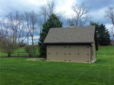 Storage shed with concrete floors