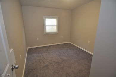 Bedroom #2 with new  carpet, Mini blind, wall heater