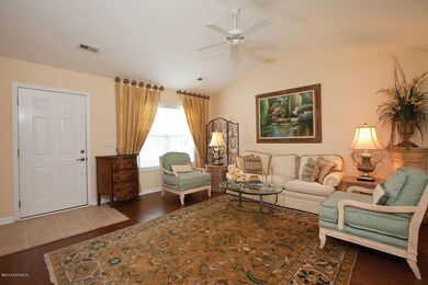 Vaulted ceiling and upgraded wood floors