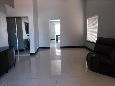 TILE FLOORS IN LIVING ROOM KITCHEN AND HALL WAY