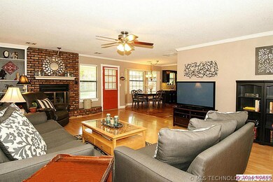 AN OPEN PLAN, THIS LIVING SPACE ADJOINS THE DINING