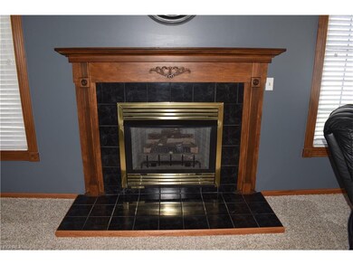 The beautiful fireplace provides warmth and cozine