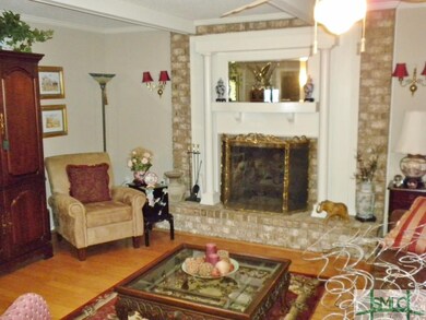 FORMAL LIVING ROOM WITH FIREPLACE & WETBAR