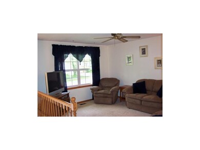 FORMAL LIVING ROOM W/CEIL FAN