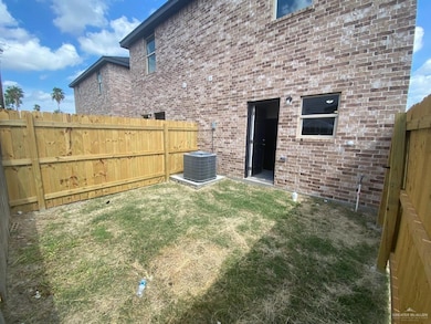 View of fenced backyard