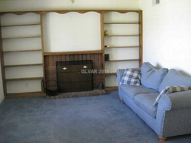 Living Room. opposite fireplace is a full wall mir