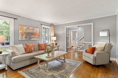 Gorgeous living room at the front with hardwood fl