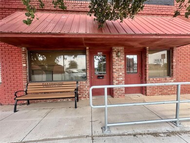 View of exterior entry featuring a porch