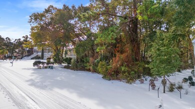 View of yard covered in snow