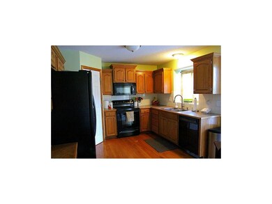 Hardwoods in kitchen, stainless double sink, walk-
