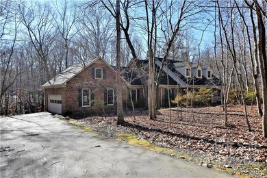 Private setting with lots of natural area and tree