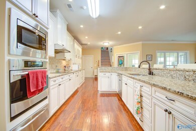 Stainless appliances, so many cabinets, a HUGE isl